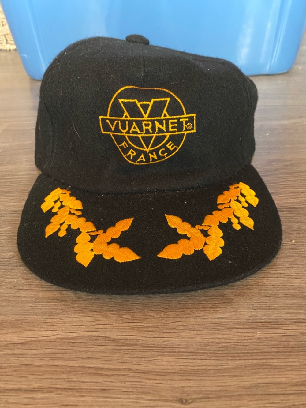 Vuarnet Black Cap with Orange Embroidered Logo and Laurel